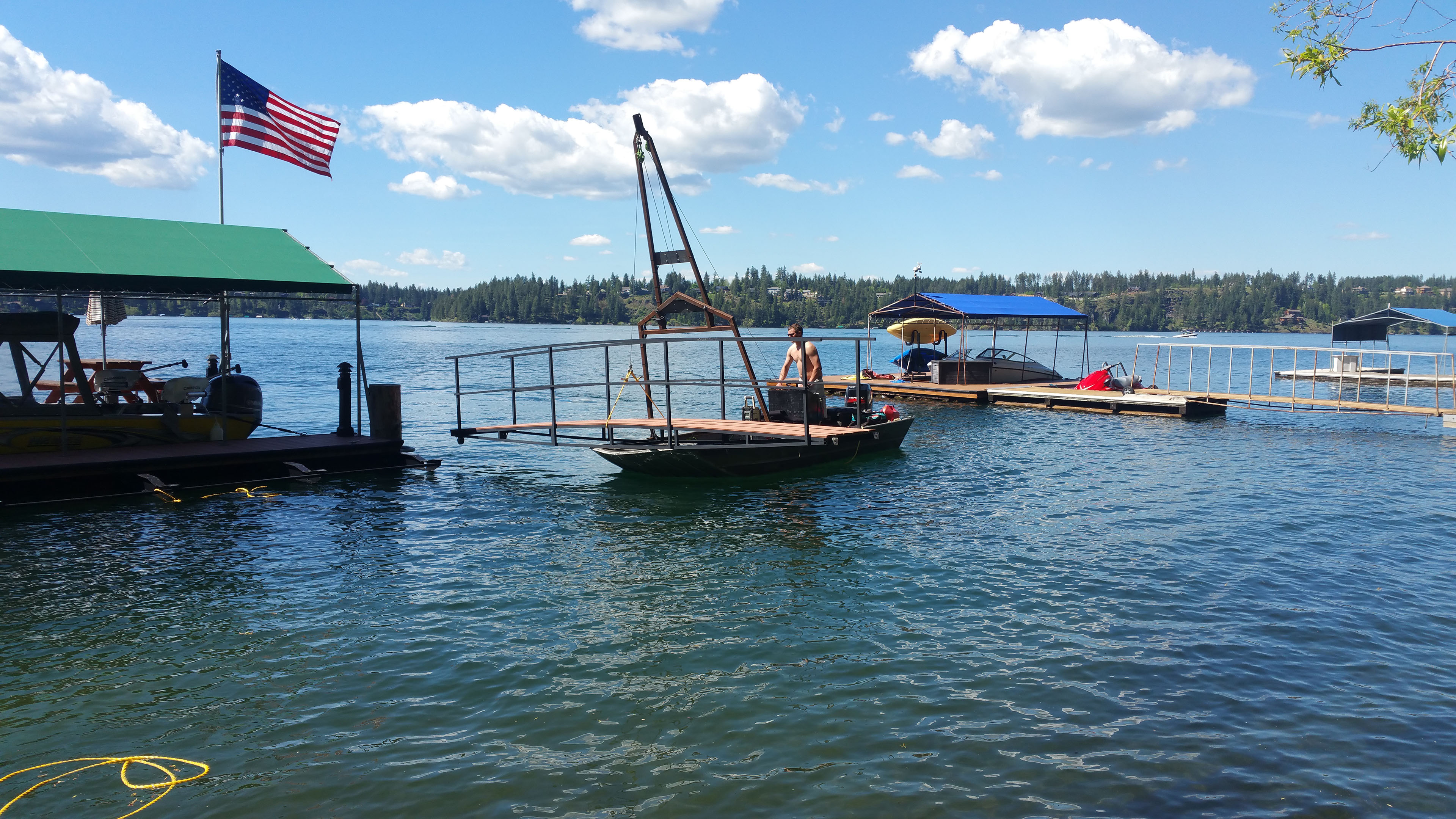 Transporting gangway with dock work boat